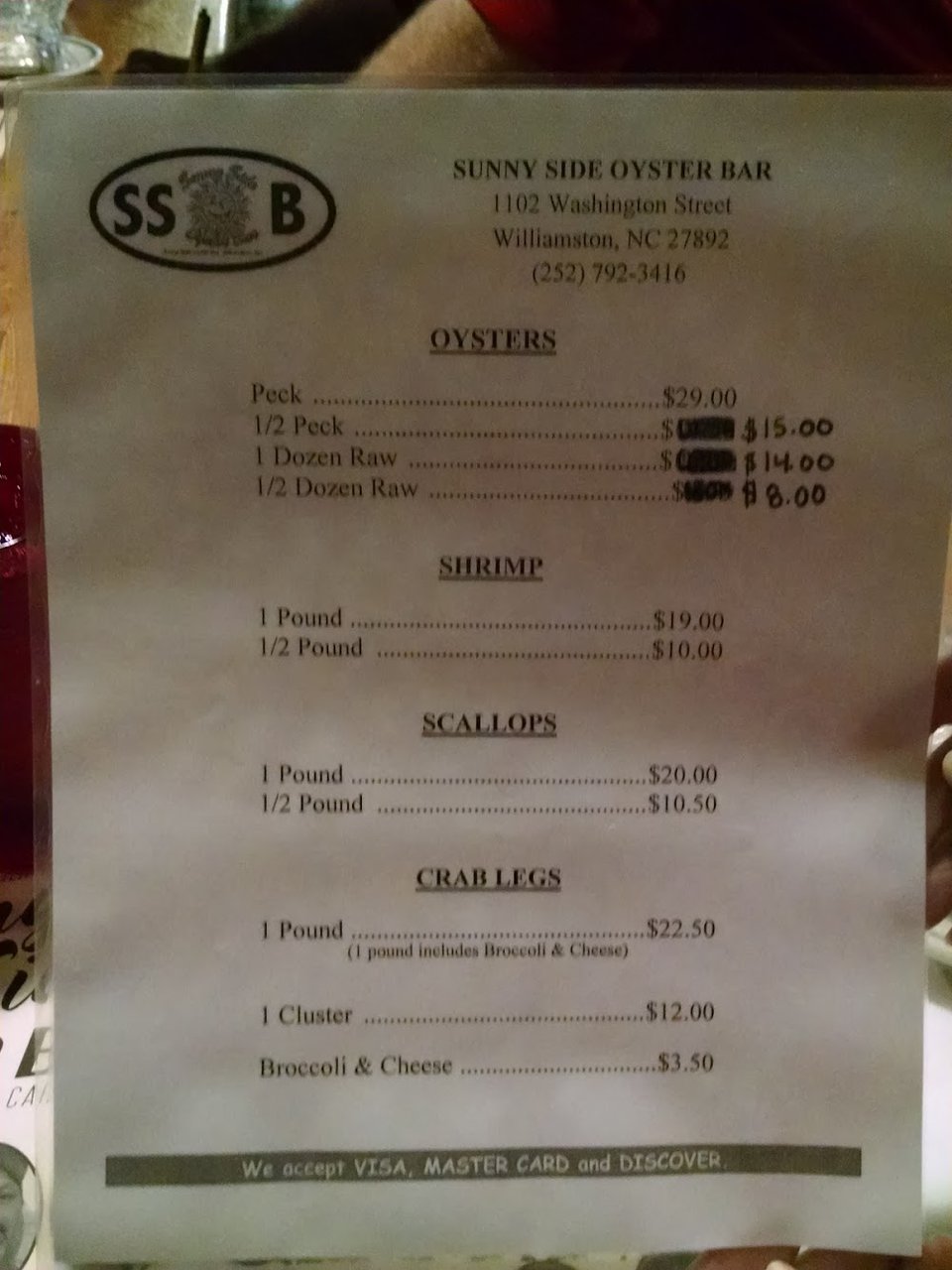 Simple menu for seafood plates and drinks.